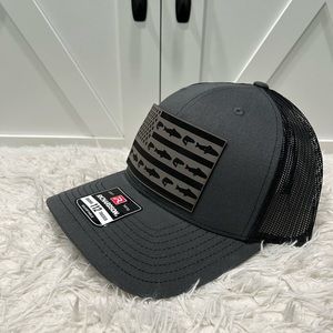 Laser engraved American flag fish. Richardson 112 trucker hat.